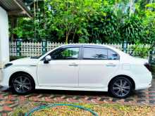 https://riyasewana.com/uploads/toyota-axio-wxb-410504522692.jpg