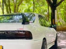 https://riyasewana.com/uploads/toyota-corolla-ae100-161036536845.jpg
