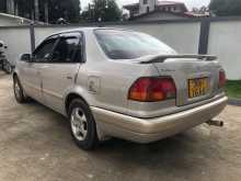 https://riyasewana.com/uploads/toyota-corolla-ae110111-1997-1516115812524.jpg
