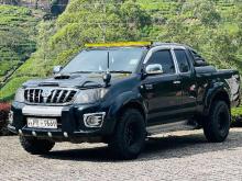 https://riyasewana.com/uploads/toyota-hilux-vigo-192115326075.jpg