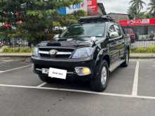 https://riyasewana.com/uploads/toyota-hilux-vigo-2006-117050212912.jpg