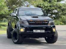 https://riyasewana.com/uploads/toyota-hilux-vigo-248514222152.jpg