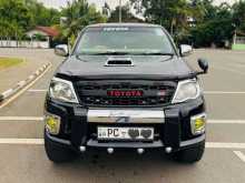 https://riyasewana.com/uploads/toyota-hilux-vigo-251130324092.jpg