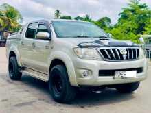 https://riyasewana.com/uploads/toyota-hilux-vigo-3012591622073.jpg