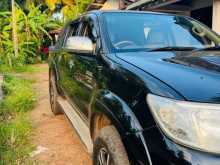 https://riyasewana.com/uploads/toyota-hilux-vigo-71815144712.jpg