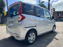 https://riyasewana.com/uploads/toyota-roomy-tank-2023-1814384512433.jpg